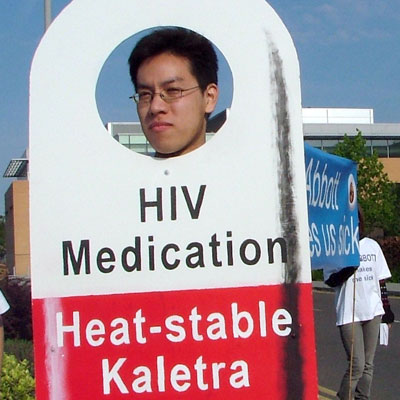 Picture of person dressed as Kaletra pill protesting